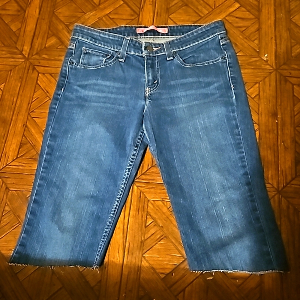 Levi's extra low rise boot cut cropped denims.